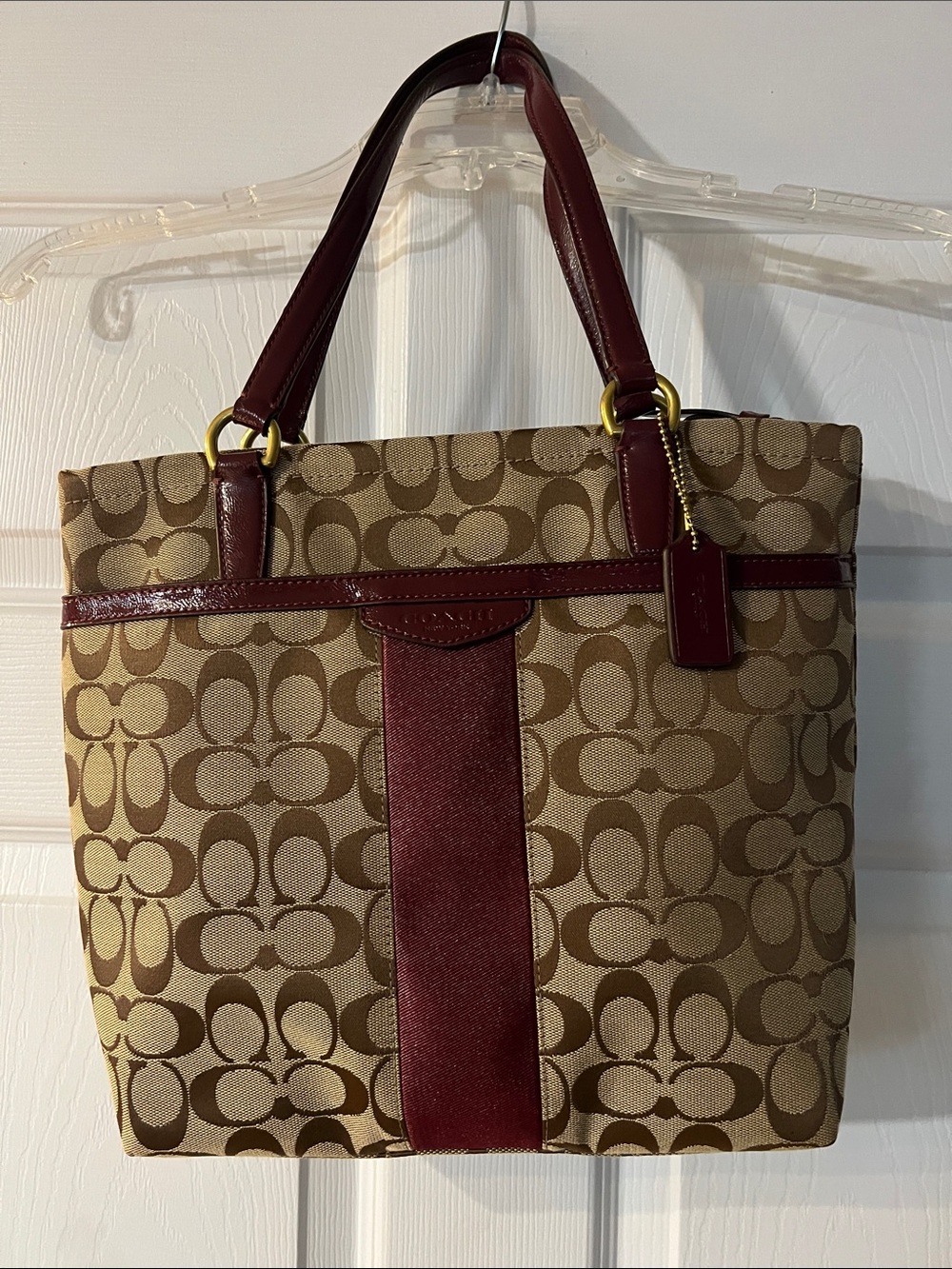 Coach Brown Signature Canvas Tote with Burgundy Leather Trim